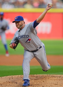 Aug 16, 2014; Chicago, IL, USA; Toronto Blue Jays starting pitcher Mark Buehrle (56) delivers a pitch during the first inning against the Chicago White Sox at U.S Cellular Field. Mandatory Credit: Dennis Wierzbicki-USA TODAY Sports